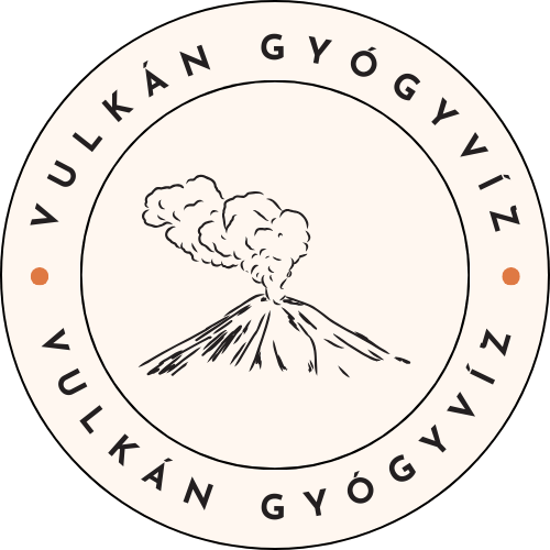 dekorelem, egy dupla kör közepében vonalakkal rajzolt füstölgő vulkán, a kör külső gyűrűjén a felirat: Vulkán Gyógyvíz